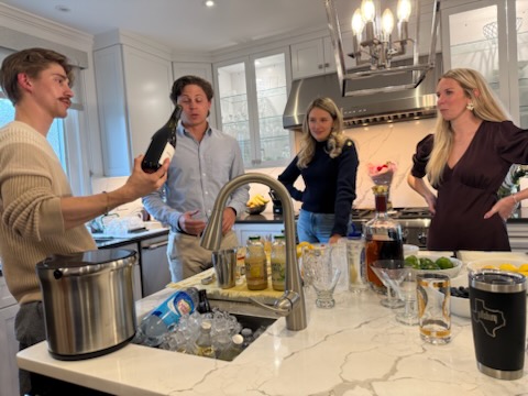 Guests receiving beverage service at an indoor event bar