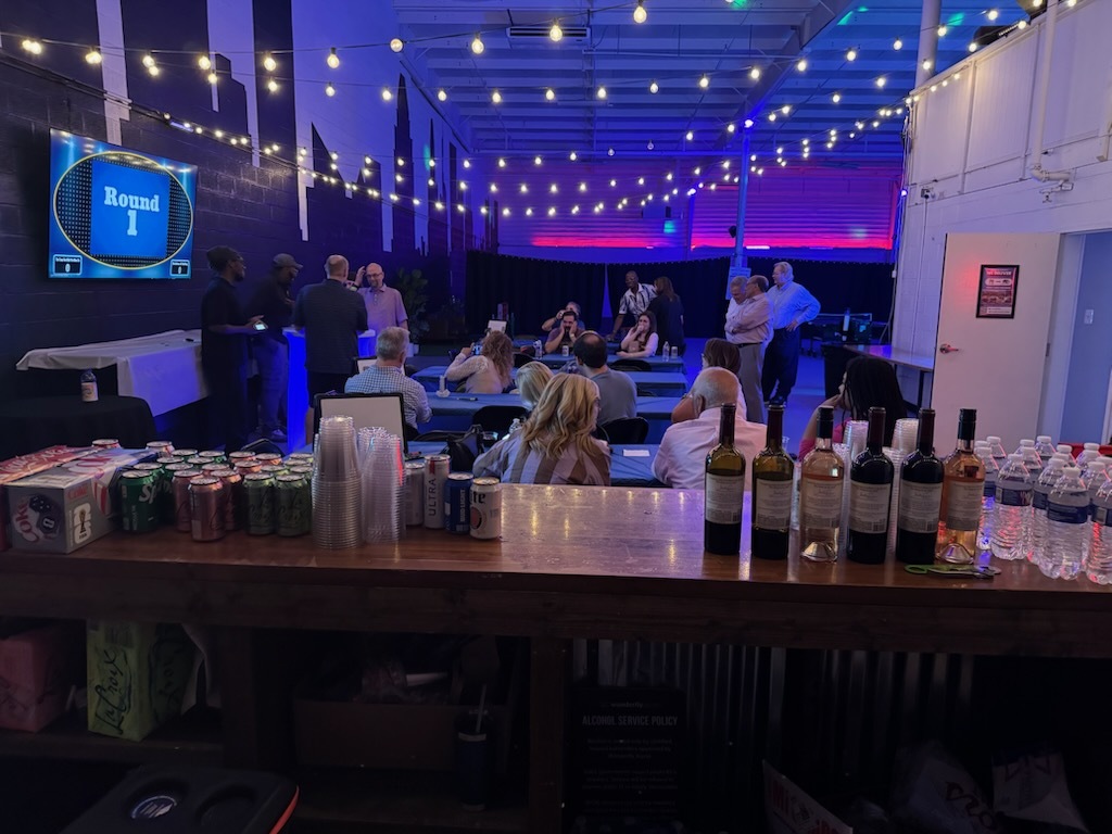 Indoor welcome party with prepared bar service