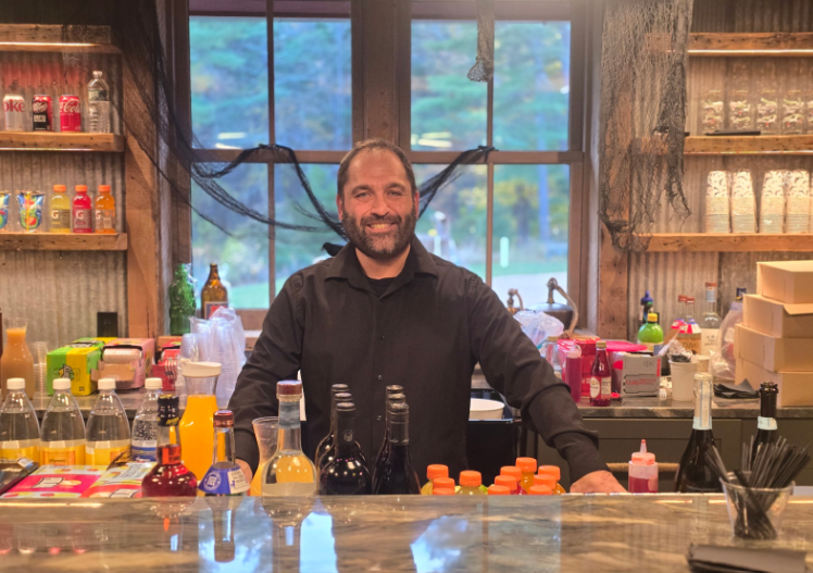 Bartender serving a family event bar